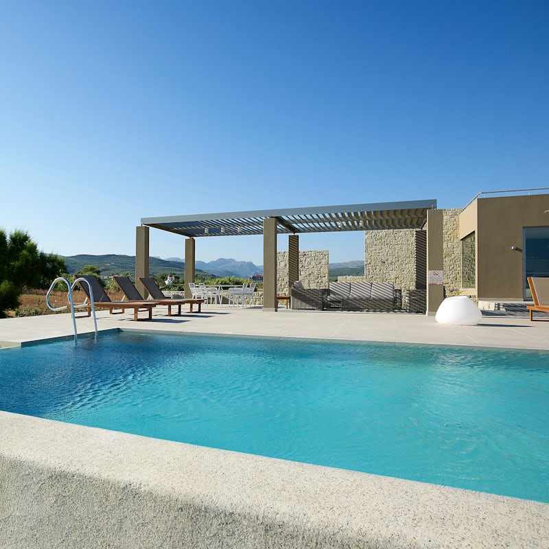 Take a refreshing dip in the sparkling swimming pool