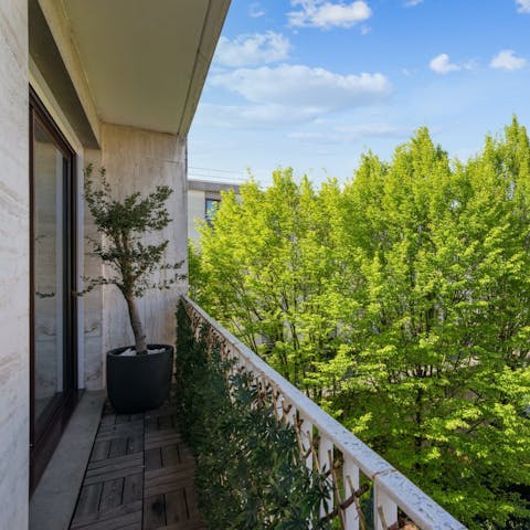 Pad out to the balcony and admire the treetop views