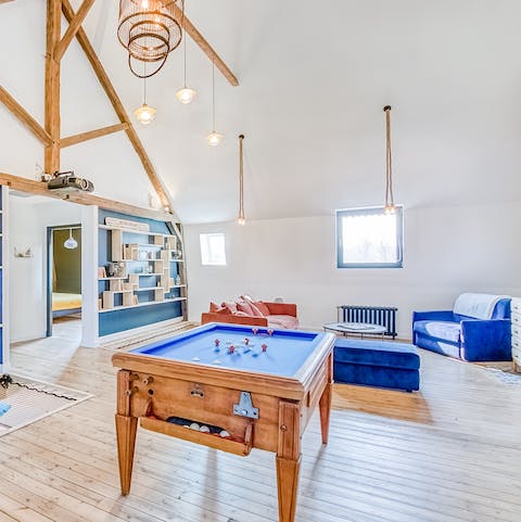 Enjoy a game of billiards in your light and open living space