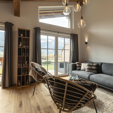 Gaze out of the living room windows to the Alpine mountain view