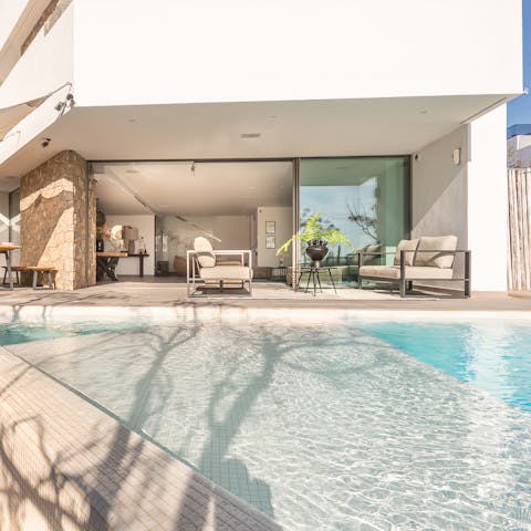 Lounge poolside in between dips under the Spanish sun