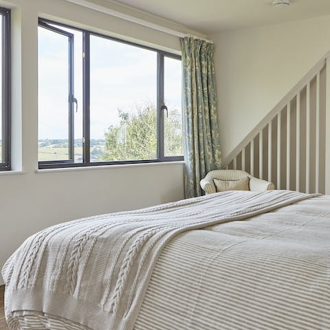 Wake up to peaceful views in the master bedroom