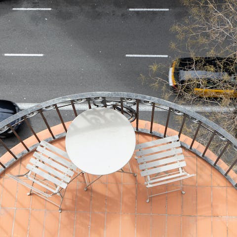 Enjoy your morning espresso on the private balcony