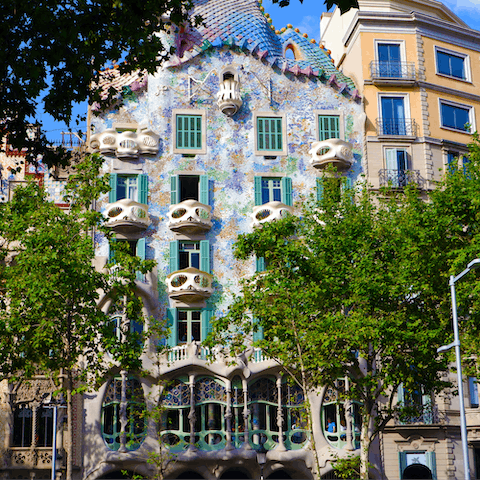 Visit Gaudí's Casa Batlló, only a fifteen-minute stroll from your apartment
