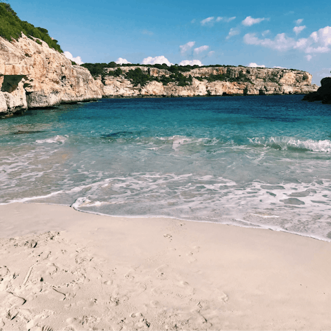 Pack your beach towel and sun cream and take the ten-minute walk to Cala San Vincent for a day on its sugary white sand