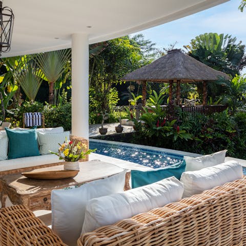 Relax together on the serene terrace, perhaps with a cocktail in hand