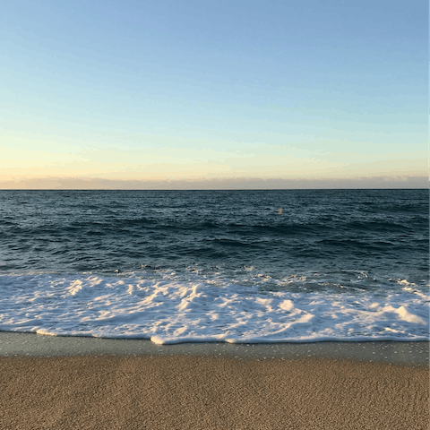 Soak up the warm Spanish sunshine on Arenal Beach, a ten-minute walk away