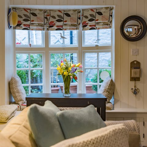 Claim the window nook for your reading spot during the stay
