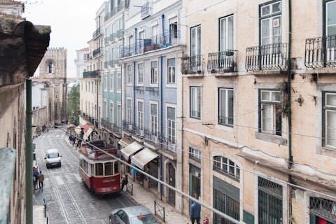 Watch Lisbon life pass by from the Pombaline balconies