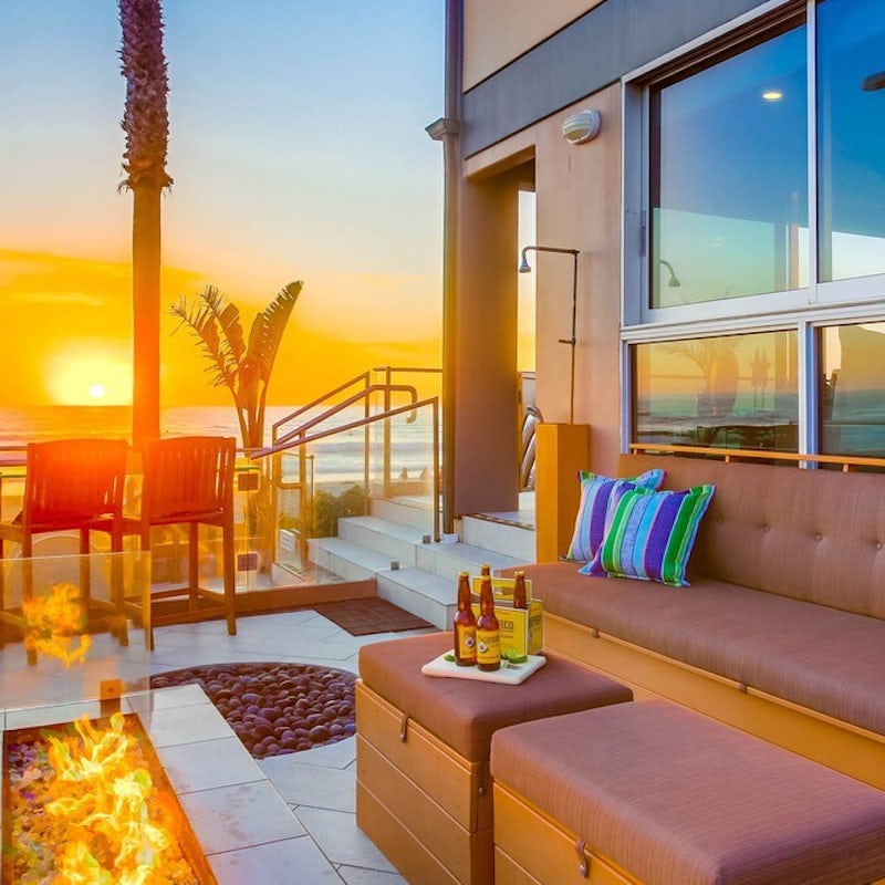 Sit outside by the fire pit and watch the sun go down