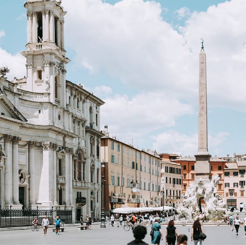 Visit Piazza Navona, less than a twenty-minute walk away