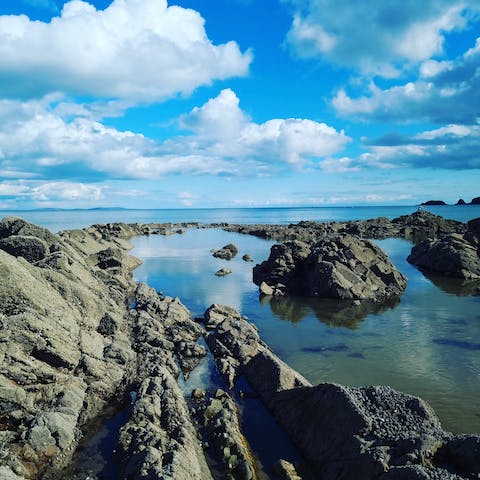 Explore the rock pools of Saundersfoot Beach, less than a ten-minute walk away