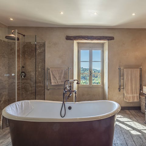 Relax and unwind in the elegant freestanding bathtub
