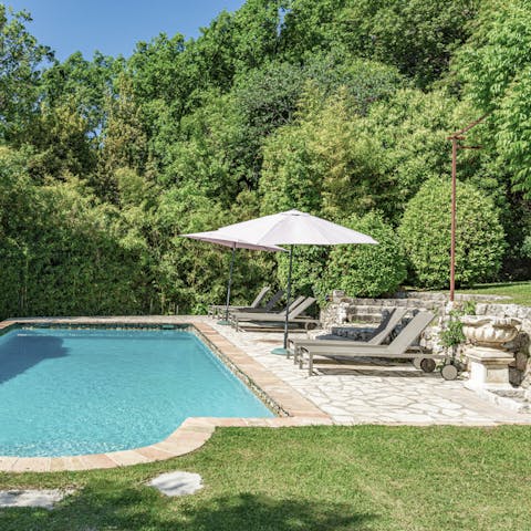 Spend days lazing around the Roman-style outdoor pool