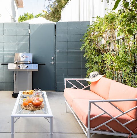 Unwind on the comfy outdoor sofa on the private patio