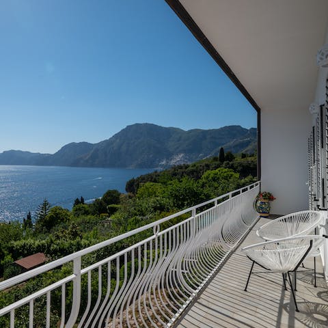 Step onto the balcony to enjoy breathtaking sea views
