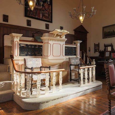 Stand at the original pulpit or play a tune on the antique piano