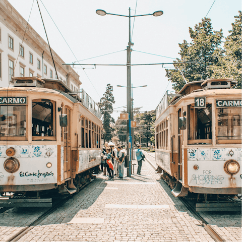 Hop on a tram at Infante stop a minute's walk down the road and explore the city's hilly peaks