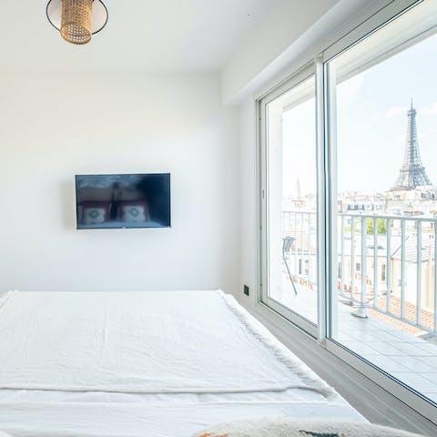 Sink into the bed after a day of Paris sightseeing