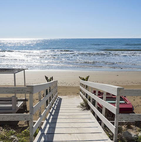 Walk straight out onto the beach from your front door