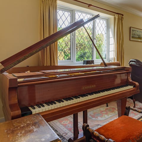 Entertain your guests at the piano in one of two living rooms