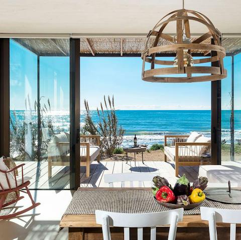 Admire the uninterrupted sea views from the dining table