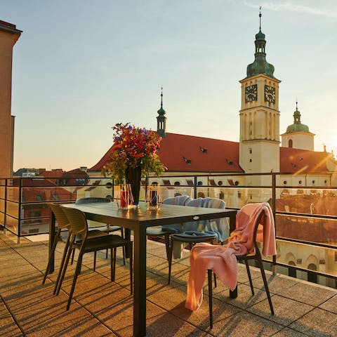 Gaze out at the Basilica of St. James from your own private terrace