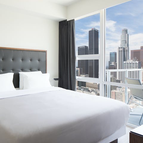 Enjoy the view from your bed through the floor-to-ceiling windows