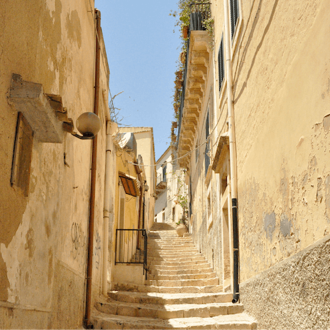 Stay just a seventeen-minute drive away from the qusint city of Noto