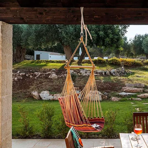 Sway in the hammock for blissful moments of relaxation in the garden 