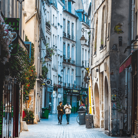 Wander around the picturesque, cobbled streets of local  Le Marais