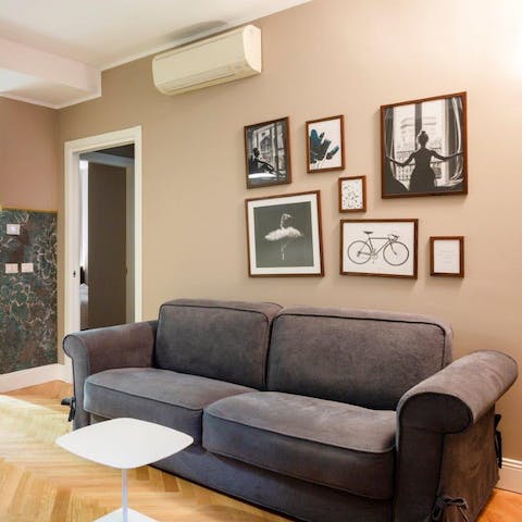 Stretch out in the living area after a day of discovering Milan