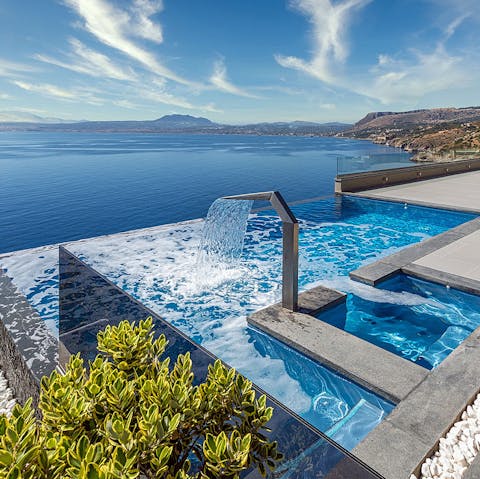 Dip your toes into the infinity pool with a waterfall, perfect for lazy afternoons