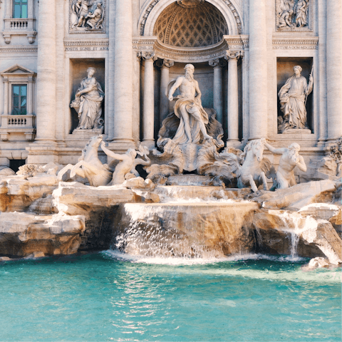 Toss a coin into the iconic Trevi Fountain – it's a short walk away