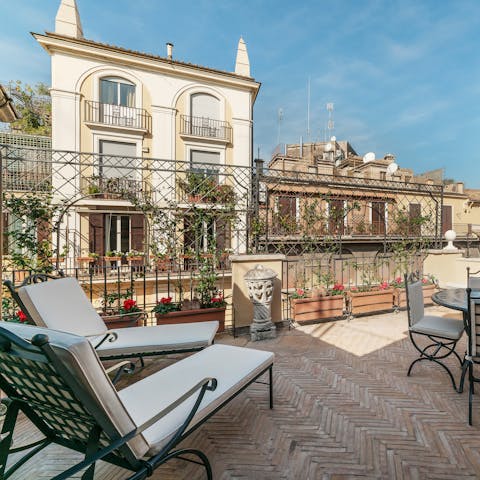 Stretch out in the sun on the private rooftop terrace