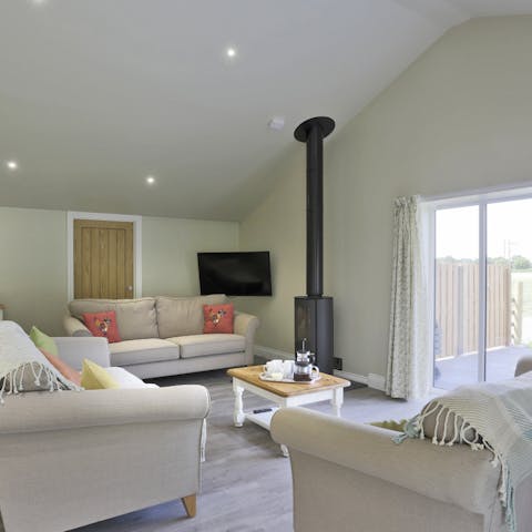 Return home and put the log-burner on to warm up cold feet