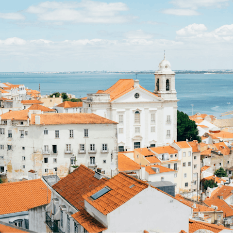 Wind your way through streets of Lisbon and discover the Santo António neighbourhood from your door