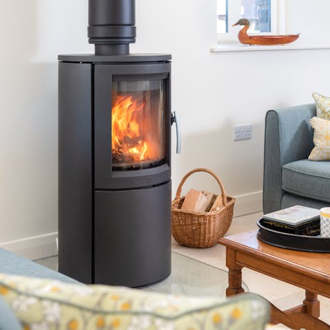 Snuggle up for winter stays by the contemporary log burner