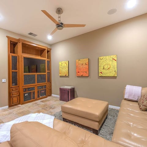 Curl up for a cosy movie night in front of the home cinema set up