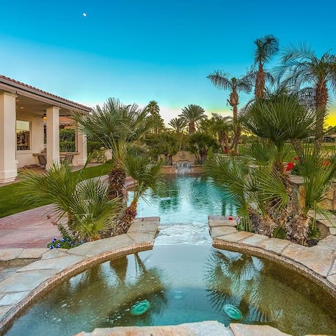 Unwind in the bubbling jacuzzi sunken spa