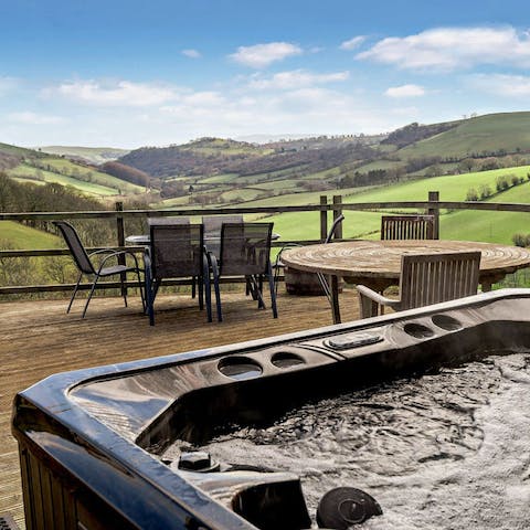 Relax in the hot tub while enjoying the spectacular view