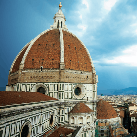 Eat gelato as you stroll a few minutes to the iconic Duomo