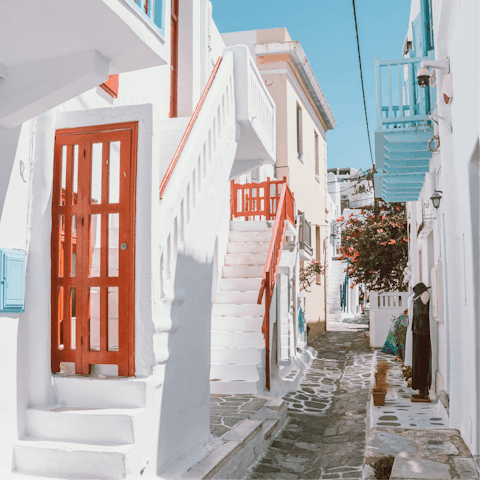 Wander the cobbled lanes in Mykonos Town, less than ten minutes by car