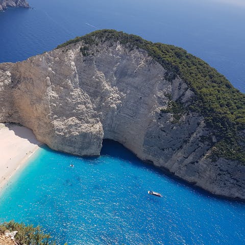 Enjoy a trip to the turquoise waters of the private beach just a short walk away