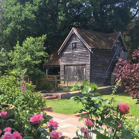 Sit out in the pretty garden area and light up the barbecue