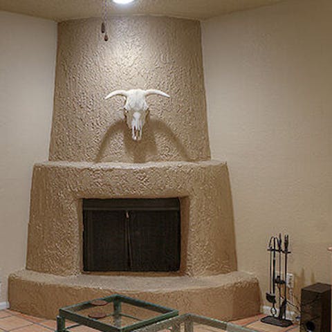 Gather around the traditional fireplace