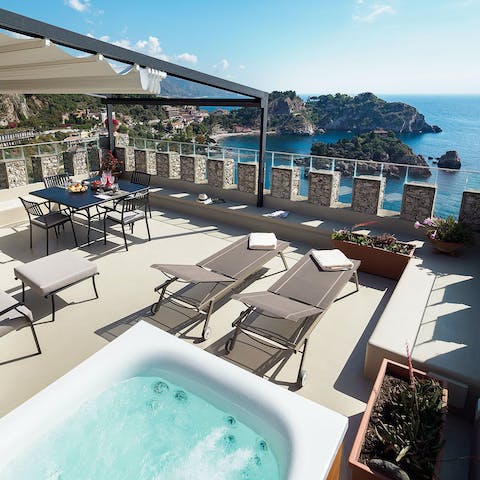 Toast the day's end from your private Jacuzzi