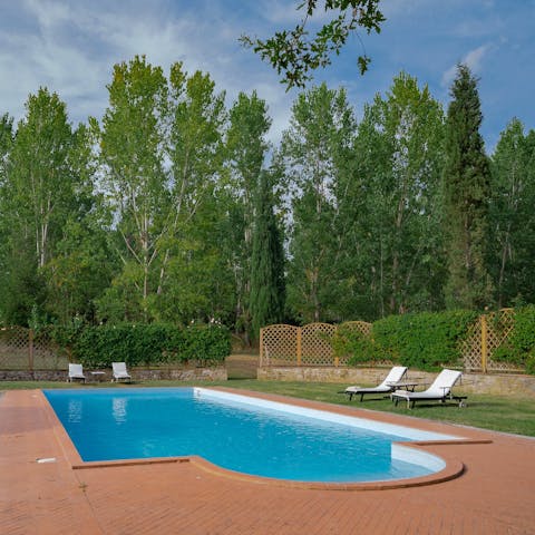 Enjoy poolside lounging before gathering for a Tuscan feast at sunset