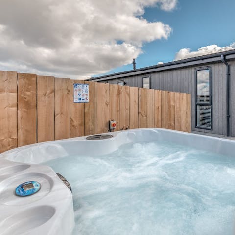 Sink into the hot tub for a long soak under the stars