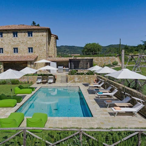 Enjoy total relaxation while lounging by the pool